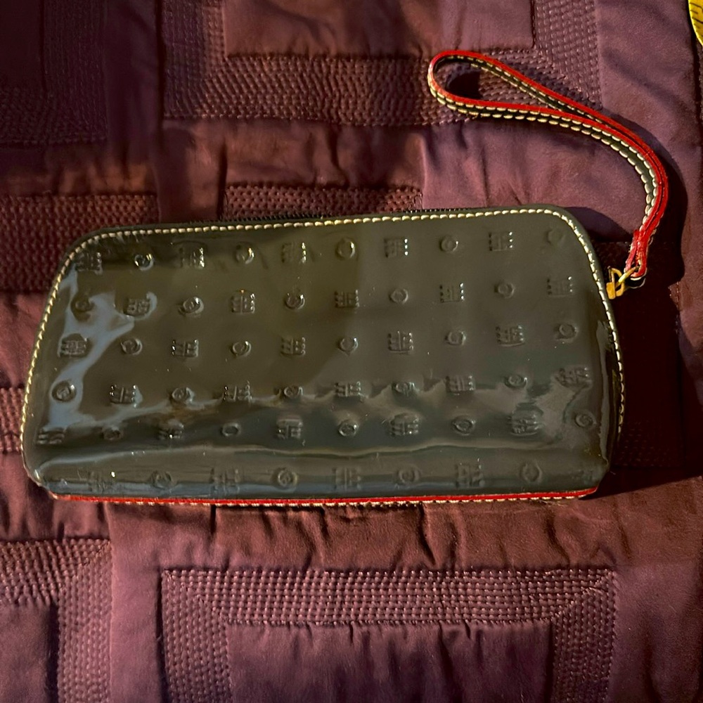Arcadia make up bag 7 inches width 4 inches high 2 inches wide.